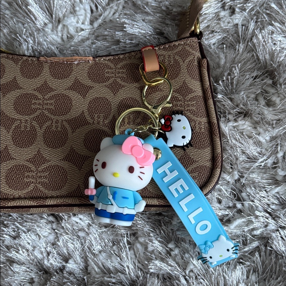 Hello Kitty Officer Keychain🩷 - Picture 3 of 5